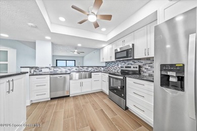 Welcome Home to the ultimate in Coastal Living with this fully - photo 10