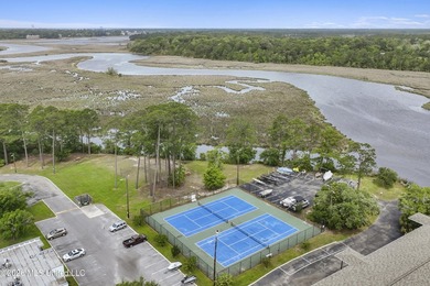Maintenance free coastal living at its finest! This is a one - photo 25