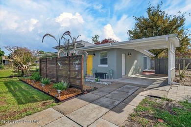 This charming mid-century, 3-bedroom home sits proudly on a - photo 1