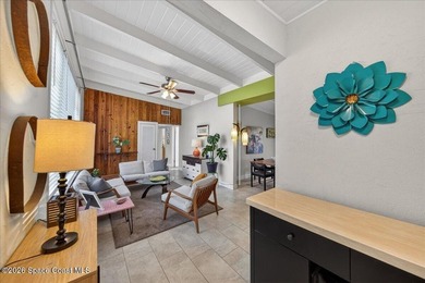 This charming mid-century, 3-bedroom home sits proudly on a - photo 2