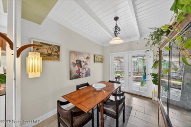 This charming mid-century, 3-bedroom home sits proudly on a - photo 4
