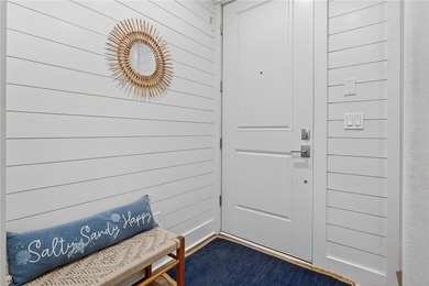 Experience elevated coastal living in this stunning three-level - photo 4