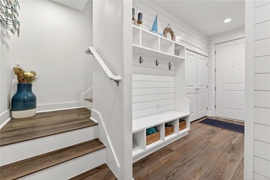Experience elevated coastal living in this stunning three-level - photo 5