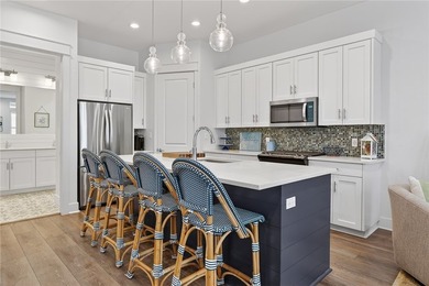 Experience elevated coastal living in this stunning three-level - photo 9