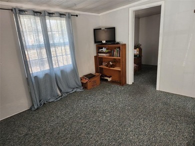 Welcome to this charming 3-bedroom, 2-bathroom mobile home. This - photo 11