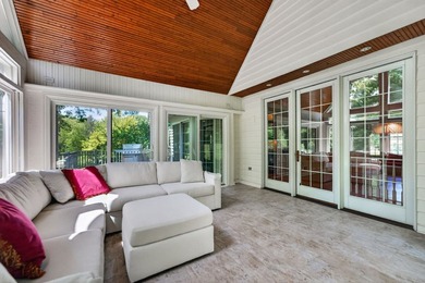 Nestled among mature trees and professionally landscaped grounds - photo 11