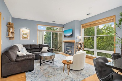 This beautifully updated end-unit condo is filled with natural - photo 12