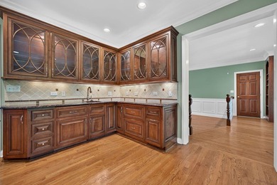 Nestled among mature trees and professionally landscaped grounds - photo 14