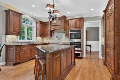 Nestled among mature trees and professionally landscaped grounds - photo 15