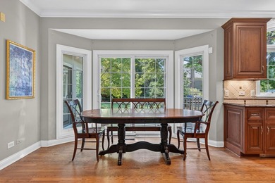 Nestled among mature trees and professionally landscaped grounds - photo 16