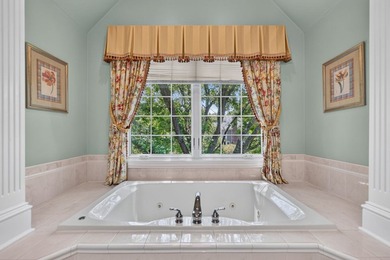 Nestled among mature trees and professionally landscaped grounds - photo 21