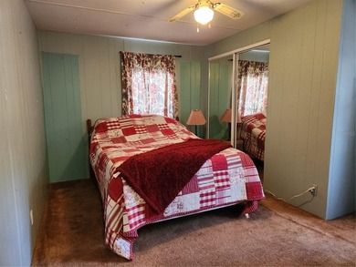 Welcome to this charming 3-bedroom, 2-bathroom mobile home. This - photo 24