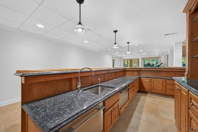 Nestled among mature trees and professionally landscaped grounds - photo 30