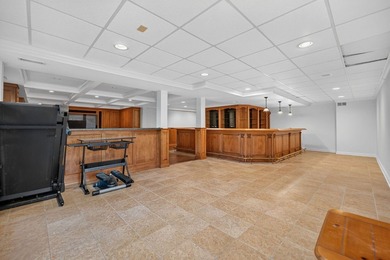 Nestled among mature trees and professionally landscaped grounds - photo 32