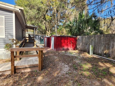 Welcome to this charming 3-bedroom, 2-bathroom mobile home. This - photo 33