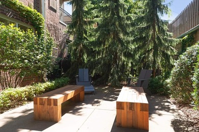 This beautifully updated end-unit condo is filled with natural - photo 35
