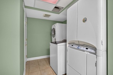 Nestled among mature trees and professionally landscaped grounds - photo 36