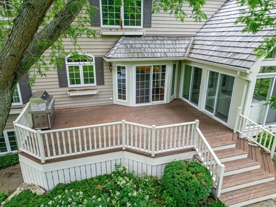 Nestled among mature trees and professionally landscaped grounds - photo 39