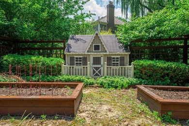 Nestled among mature trees and professionally landscaped grounds - photo 44