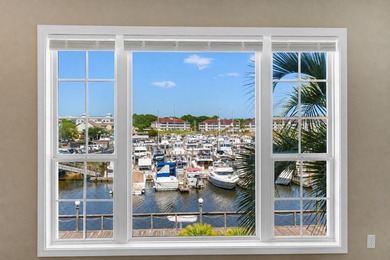Wake up to beautiful marina views from this partially furnished - photo 15
