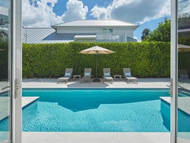 Four blocks to the beach in the heart of Olde Naples, this fully - photo 30