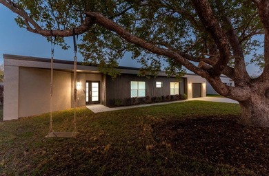 Life at 455 Riverview Avenue begins beneath the quiet canopy of - photo 7
