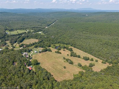 Nestled on 30 pristine acres and bordered on two sides by the - photo 11