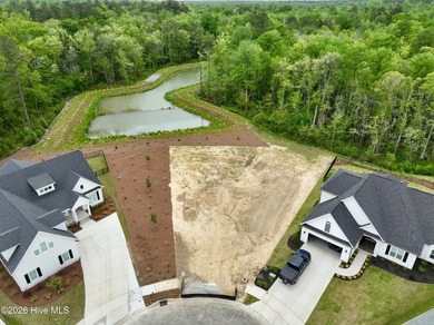 Nestled within the tranquil embrace of Brunswick Forest lies - photo 1