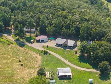 Nestled on 30 pristine acres and bordered on two sides by the - photo 15