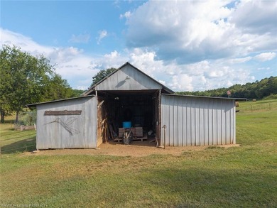 Nestled on 30 pristine acres and bordered on two sides by the - photo 18