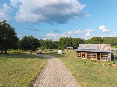 Nestled on 30 pristine acres and bordered on two sides by the - photo 21