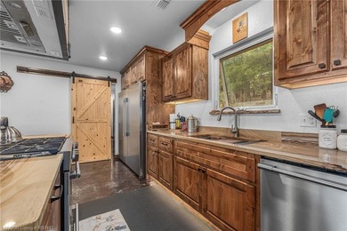 Nestled on 30 pristine acres and bordered on two sides by the - photo 47