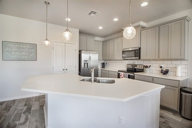 Welcome to 1012 Ocean Breeze, a beautifully built 3-bedroom - photo 10