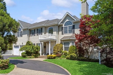 Nestled in the heart of the Five Towns, this impressive Colonial - photo 1