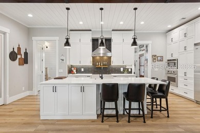Step into a truly exceptional marshfront retreat where modern - photo 13