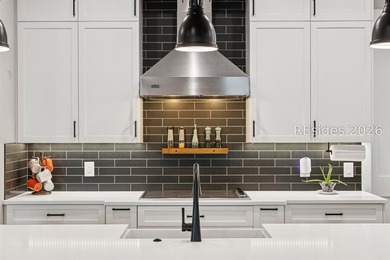 Step into a truly exceptional marshfront retreat where modern - photo 15