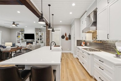 Step into a truly exceptional marshfront retreat where modern - photo 16