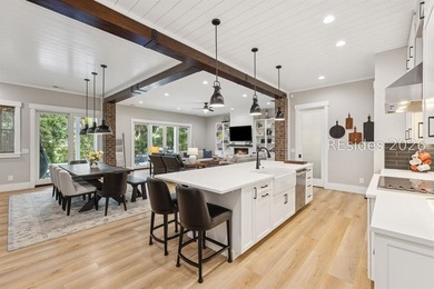 Step into a truly exceptional marshfront retreat where modern - photo 17