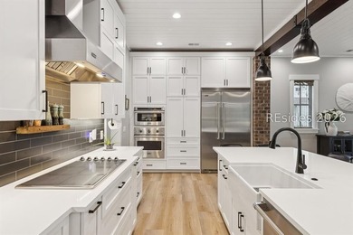 Step into a truly exceptional marshfront retreat where modern - photo 18