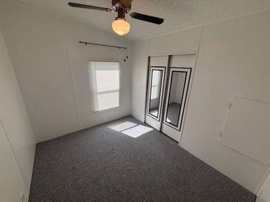 Seller offering FREE LOT RENT FOR 3 MONTHS AND GOLF CART WITH - photo 19