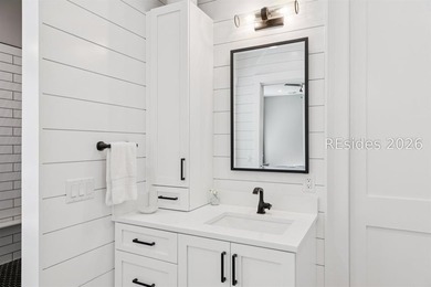 Step into a truly exceptional marshfront retreat where modern - photo 26