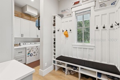 Step into a truly exceptional marshfront retreat where modern - photo 32