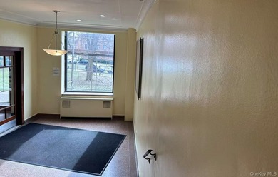 Spacious one-bedroom, one-bathroom unit featuring a bright - photo 2