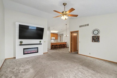 Enjoy easy living in this well-maintained condo tucked into a - photo 3