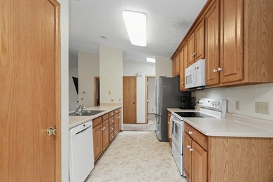 Enjoy easy living in this well-maintained condo tucked into a - photo 9