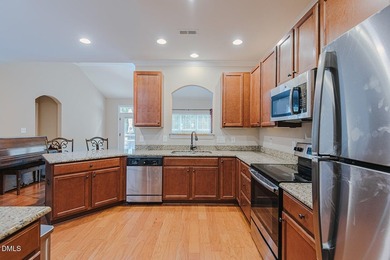 Welcome home to easy living in this hard-to-find end-unit - photo 5