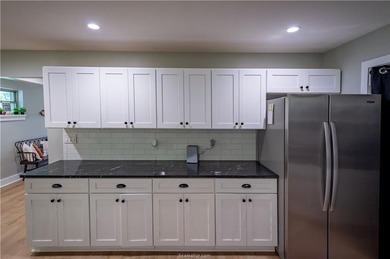 Distinctive architecture, extensive updates, and inviting - photo 12