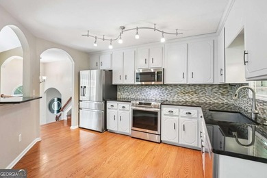Welcome home to this beautifully updated split-level retreat - photo 8