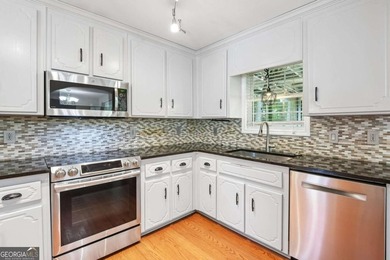 Welcome home to this beautifully updated split-level retreat - photo 9