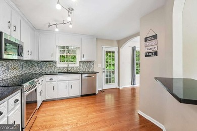 Welcome home to this beautifully updated split-level retreat - photo 10
